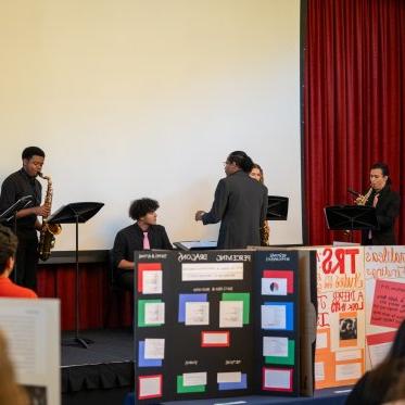 Band playing at the conference in the Moraga Room